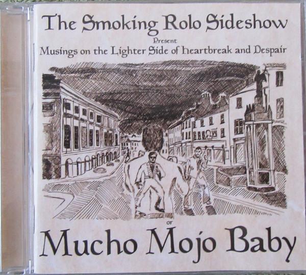 The Smoking Rolo Sideshow - Musings On The Lighter Side Of Heartbreak And Despair Or Mucho Mojo Baby